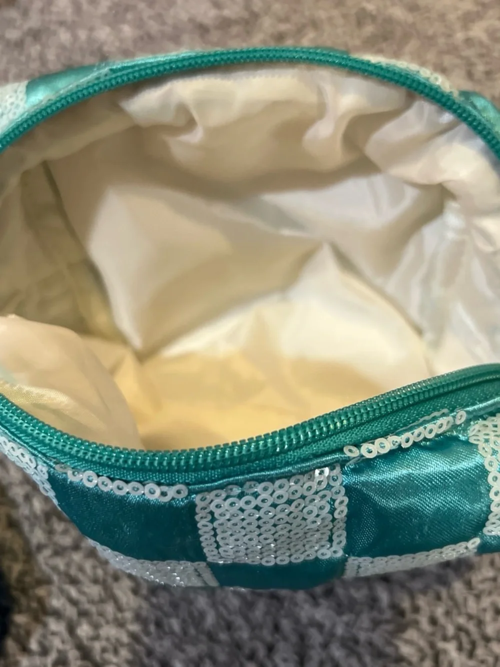 Ulta Teal and Aqua Sequin Checker + Clinique Blue Patch Cosmetic Pouches